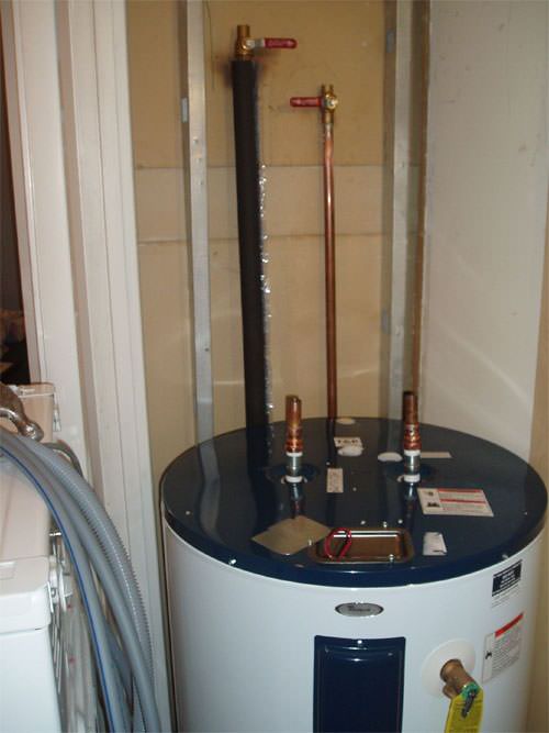 A water heater system (tank style) installed in a St. Croix Valley home